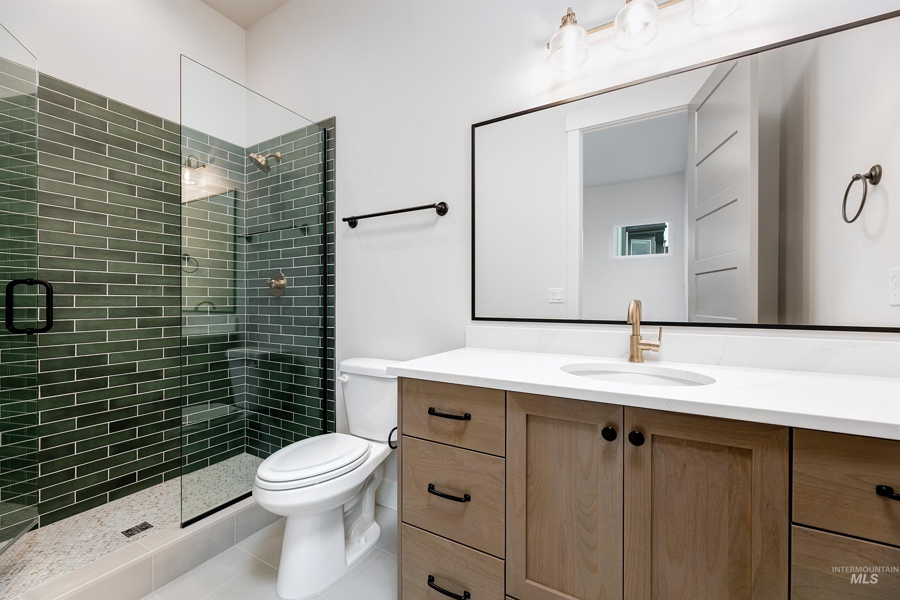 13331 North Spring Creek Way Boise, ID 83714 - Photo 14 of 43 Full bath with vanity and a stall shower