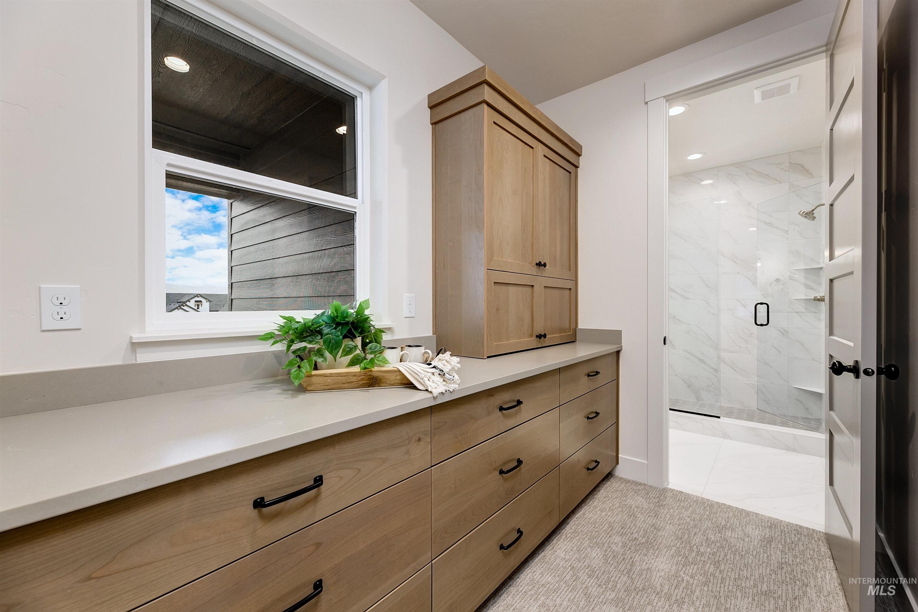 13331 North Spring Creek Way Boise, ID 83714 - Photo 23 of 43 Bathroom with a marble finish shower, vanity, and recessed lighting