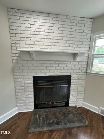 a living room with a fireplace in it