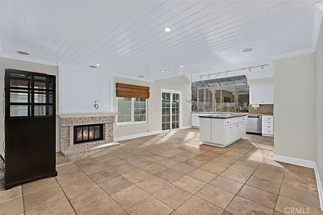 a view of a hallway and wooden floor