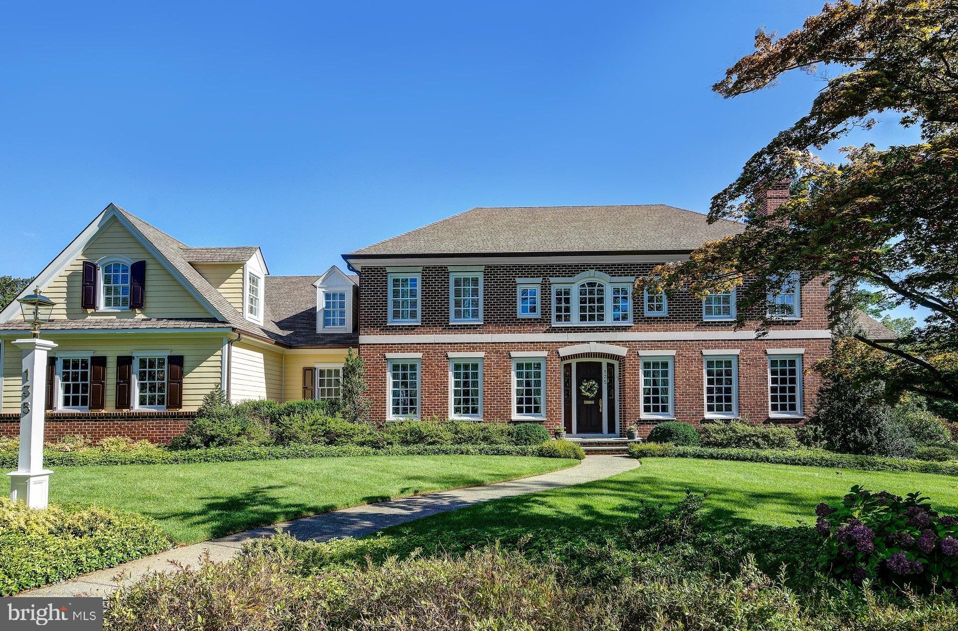 135 Winding Way Haddonfield, NJ 08033 - Photo 2 of 100 a front view of a house with a yard