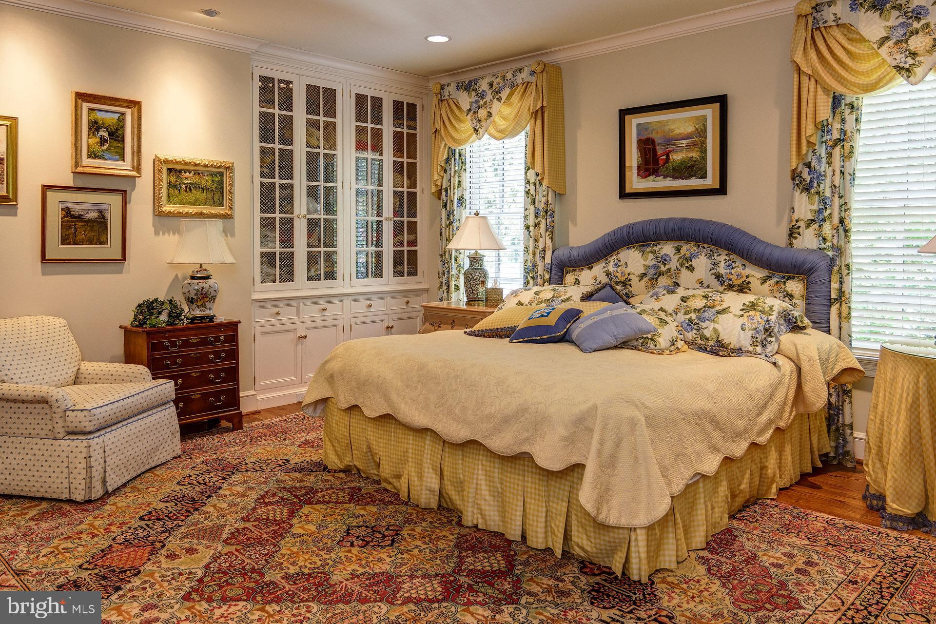 135 Winding Way Haddonfield, NJ 08033 - Photo 39 of 100 a spacious bedroom with a bed and a couch