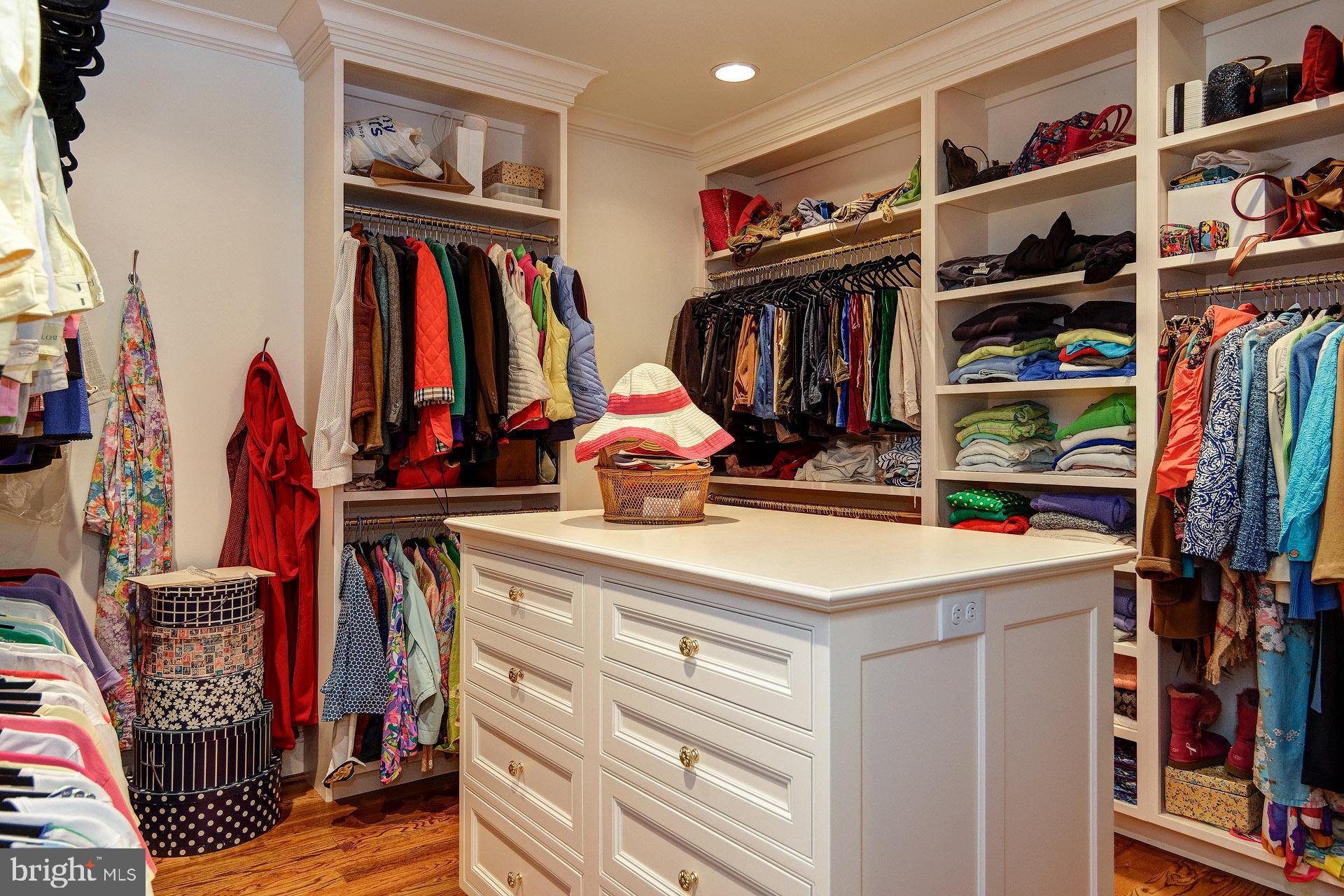 135 Winding Way Haddonfield, NJ 08033 - Photo 41 of 100 a view of walk in closet with clothes and shoes