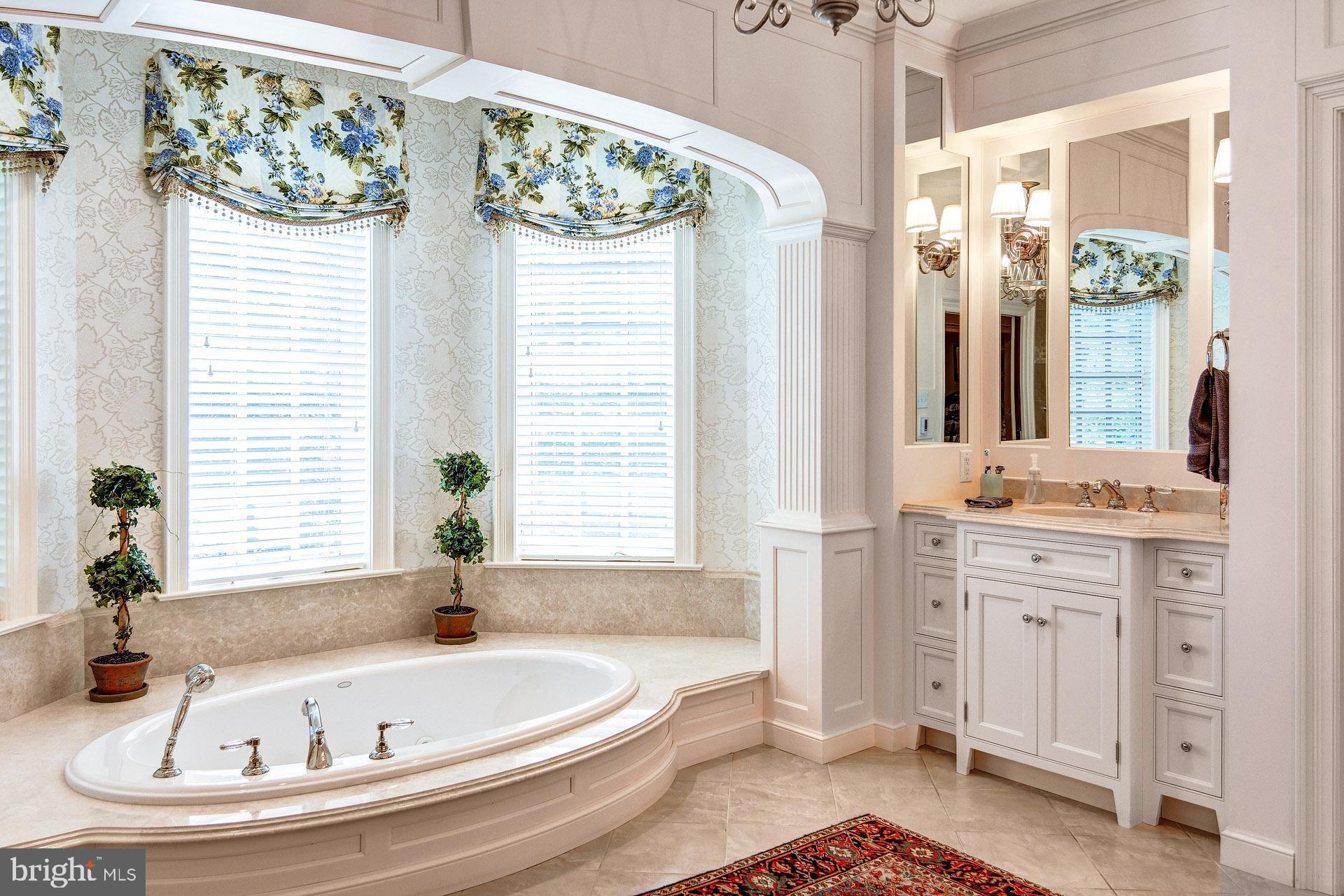 135 Winding Way Haddonfield, NJ 08033 - Photo 42 of 100 a bathroom with a bathtub and a sink