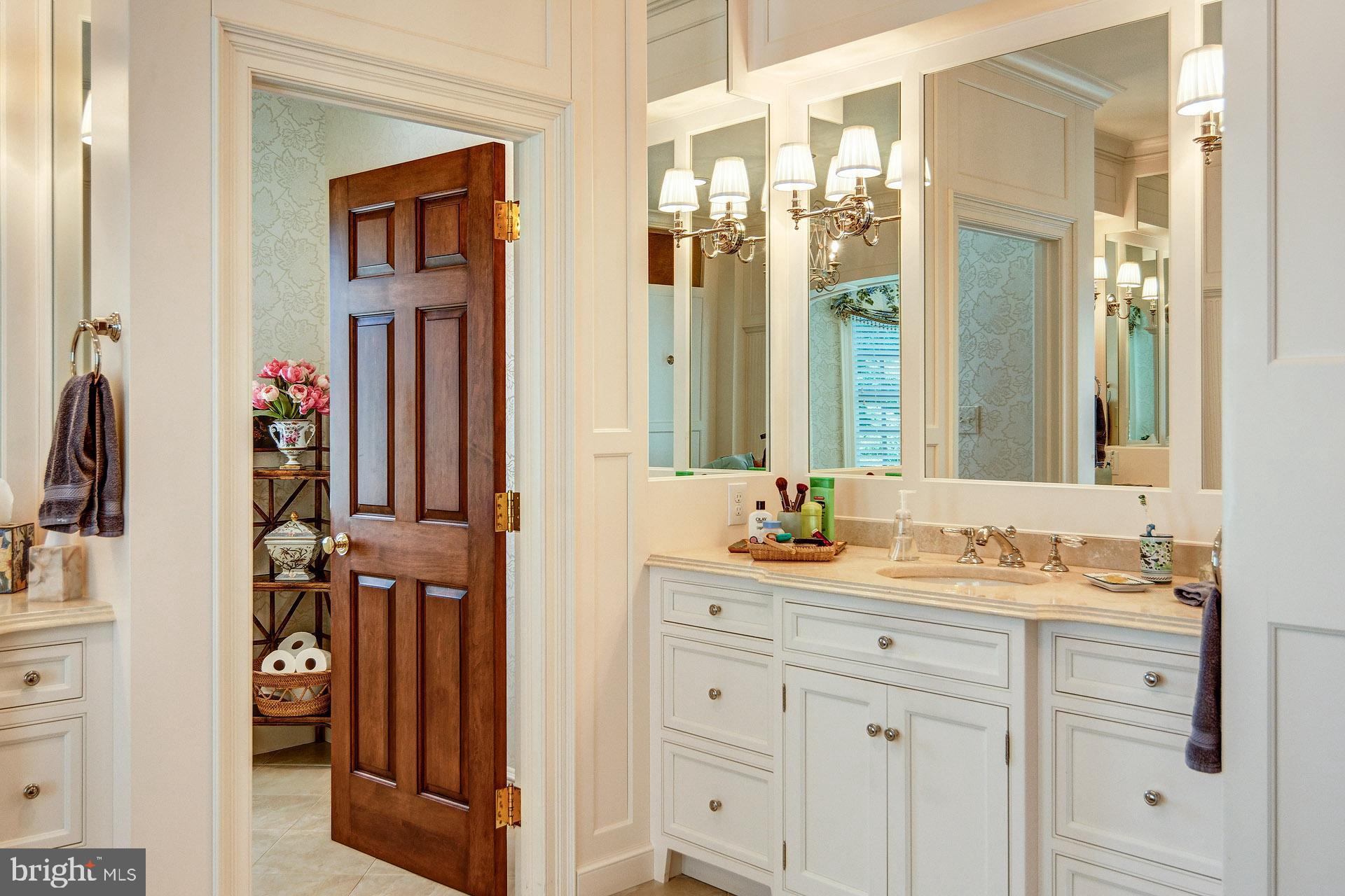135 Winding Way Haddonfield, NJ 08033 - Photo 43 of 100 a en suite bathroom with a double vanity sink a mirror and a shower