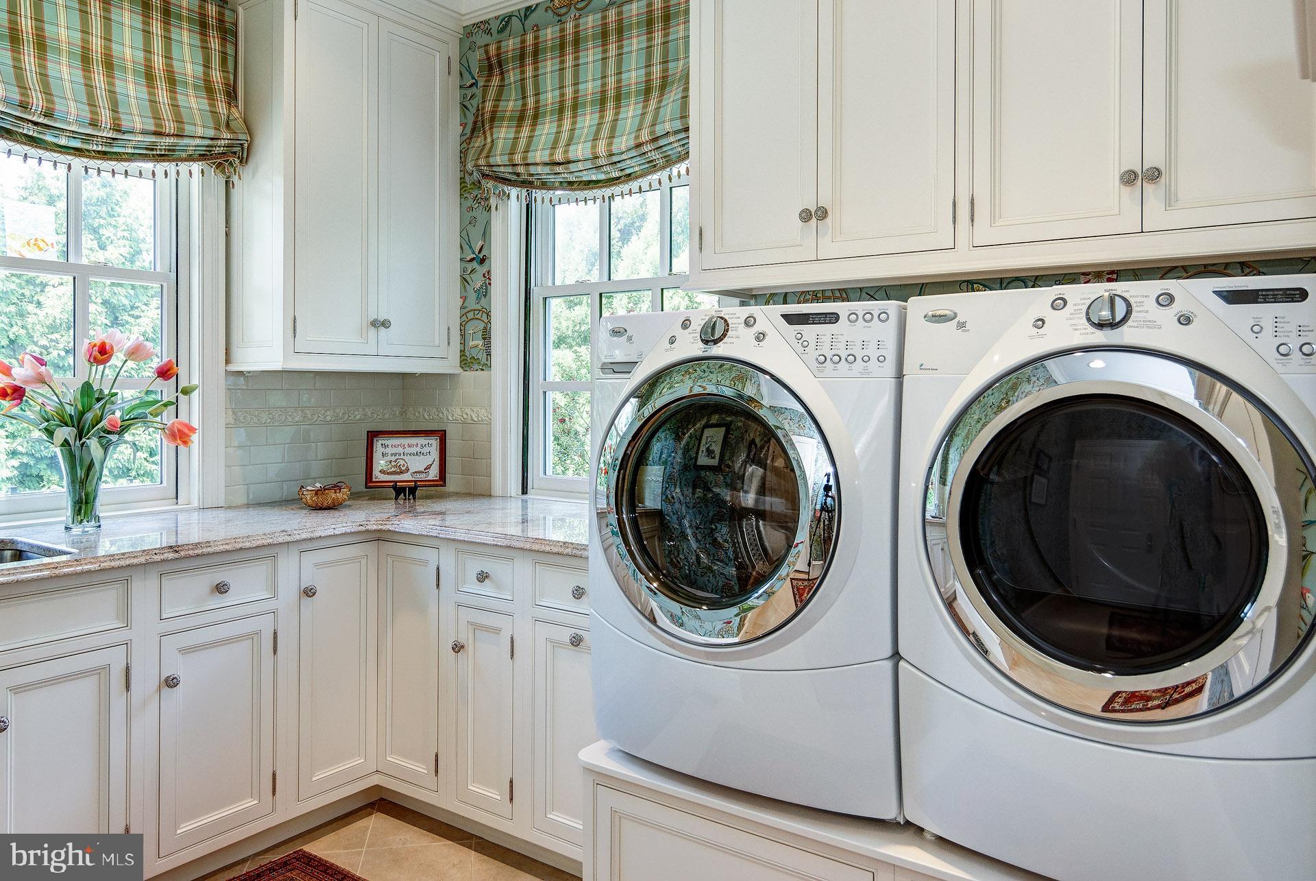 135 Winding Way Haddonfield, NJ 08033 - Photo 45 of 100 a utility room with sink dryer and washer