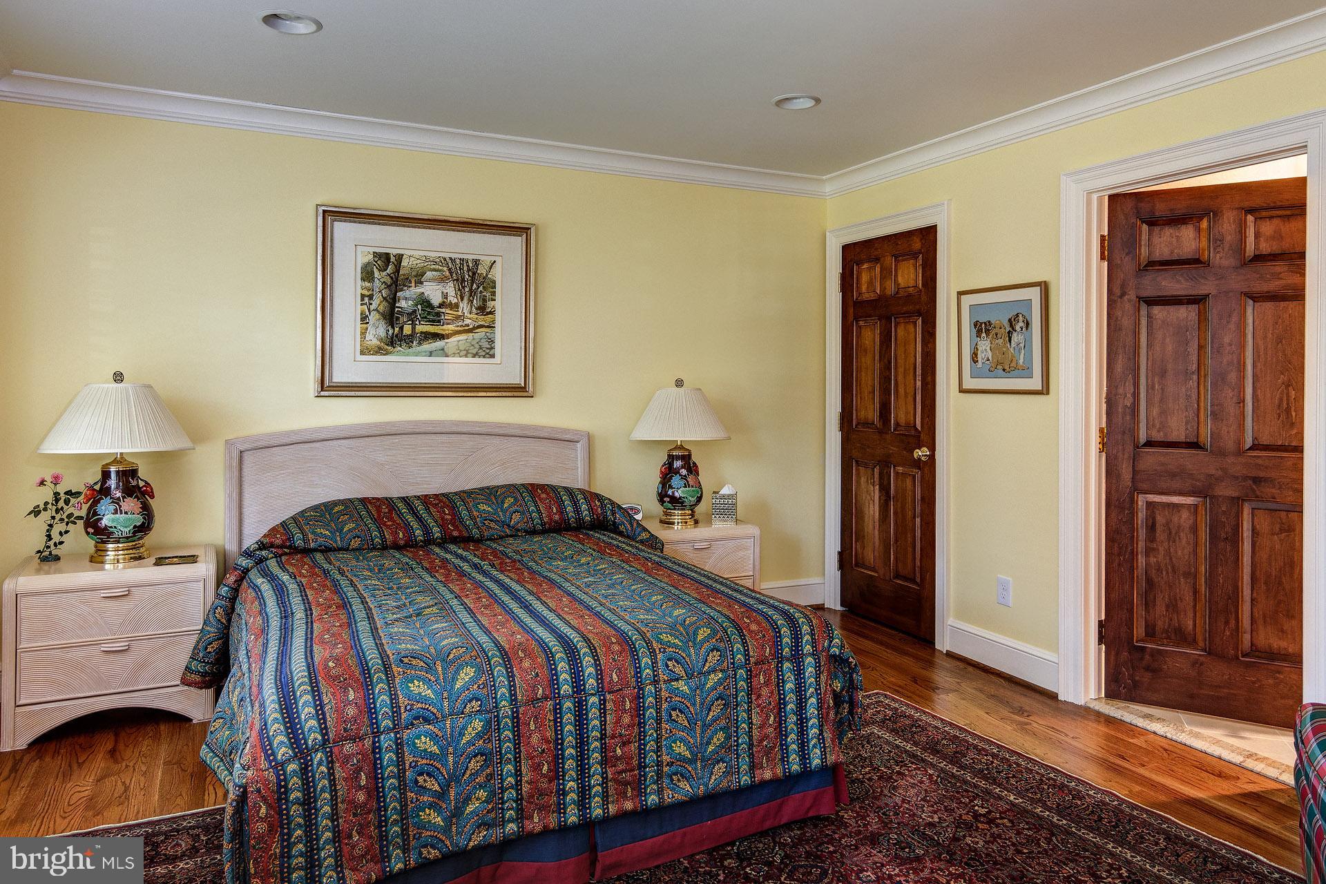 135 Winding Way Haddonfield, NJ 08033 - Photo 54 of 100 a bedroom with a bed and wooden floor