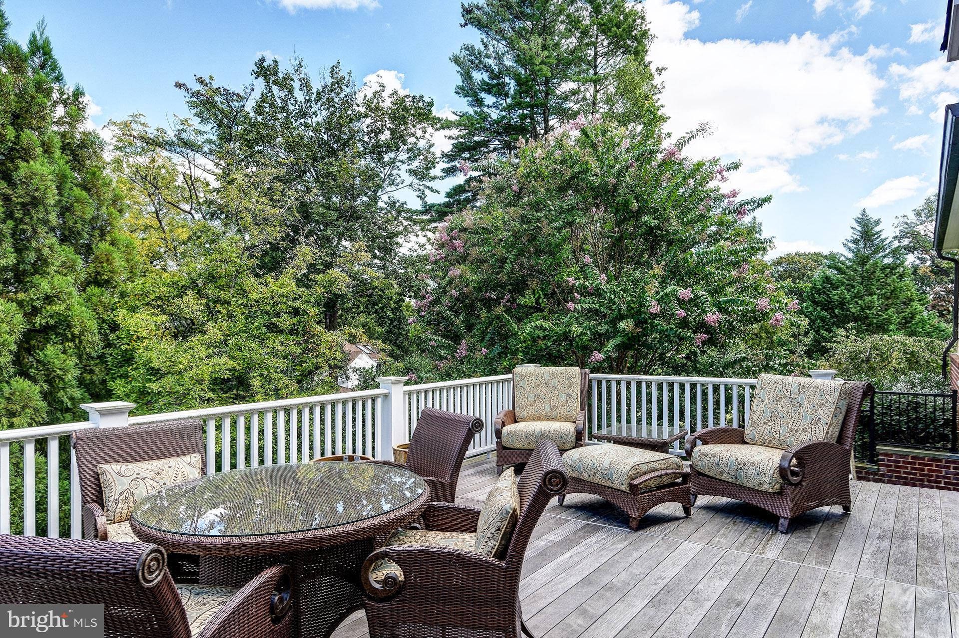 135 Winding Way Haddonfield, NJ 08033 - Photo 6 of 100 a view of a deck with a table and chairs