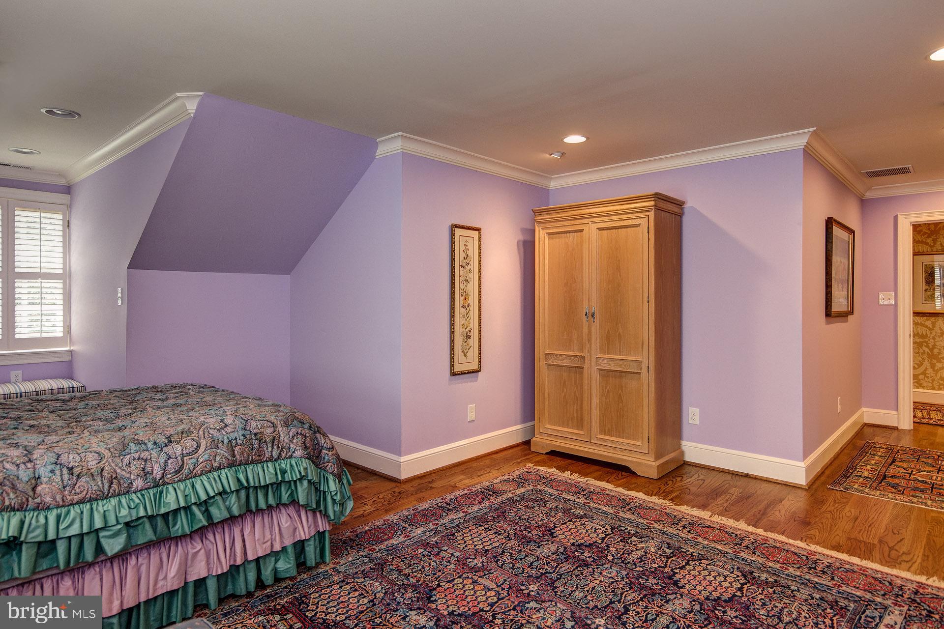 135 Winding Way Haddonfield, NJ 08033 - Photo 61 of 100 a bedroom with a bed and wooden floor