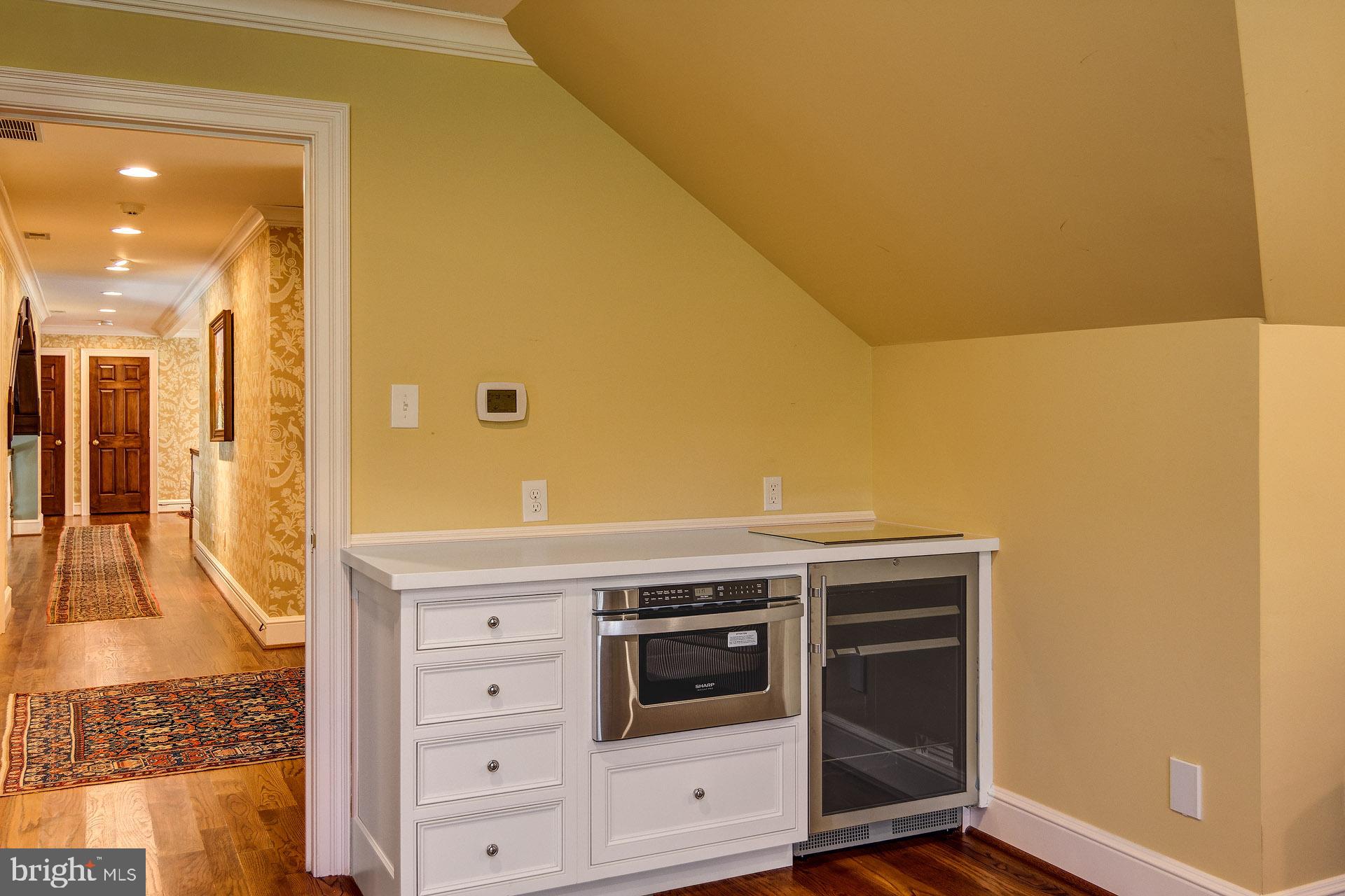 135 Winding Way Haddonfield, NJ 08033 - Photo 65 of 100 a kitchen with a stove and a microwave