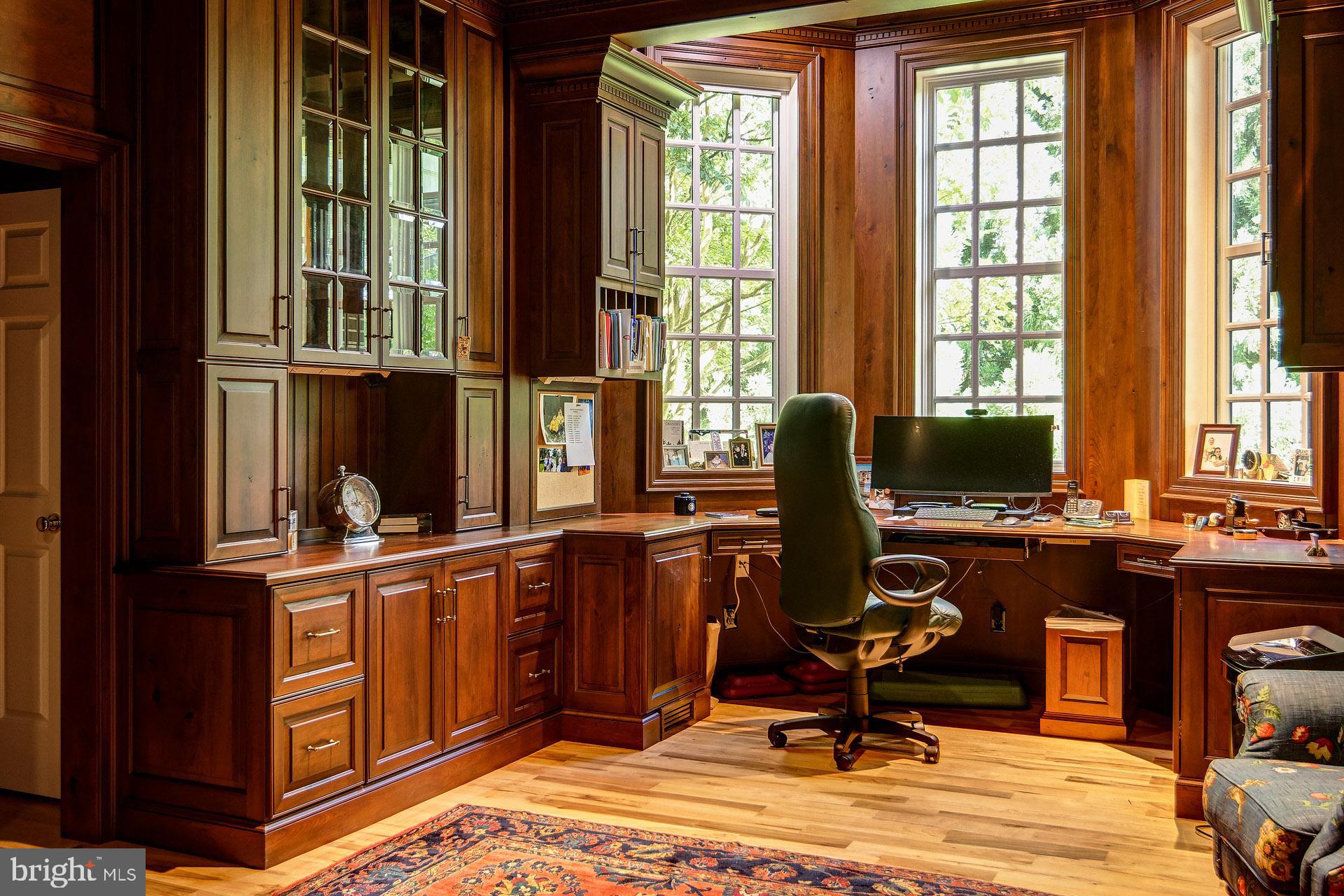 135 Winding Way Haddonfield, NJ 08033 - Photo 76 of 100 a view of a workspace with furniture and a window