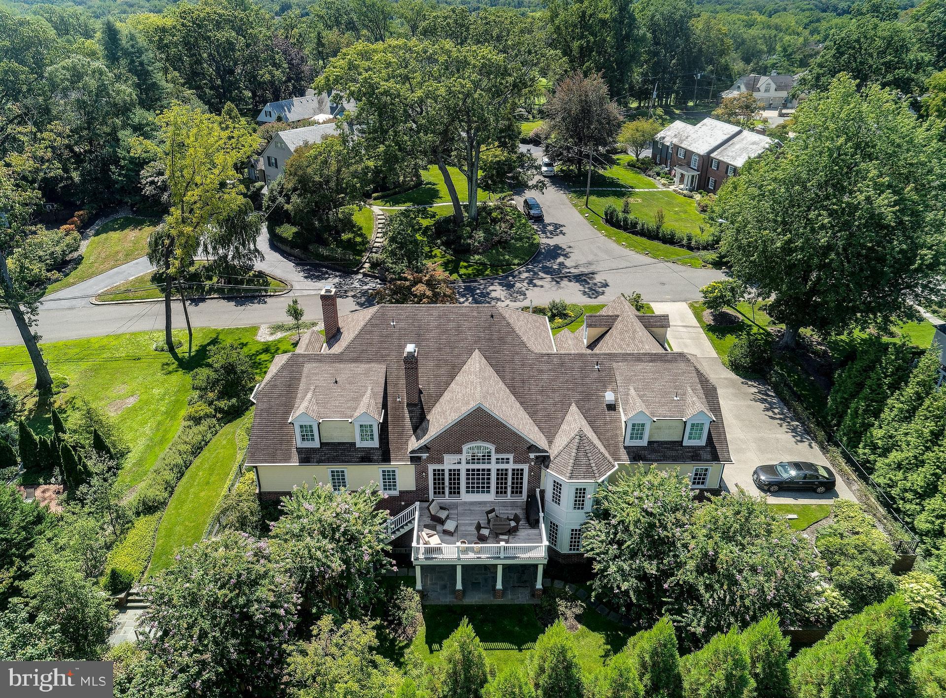 135 Winding Way Haddonfield, NJ 08033 - Photo 85 of 100 an aerial view of a house with a garden and swimming pool