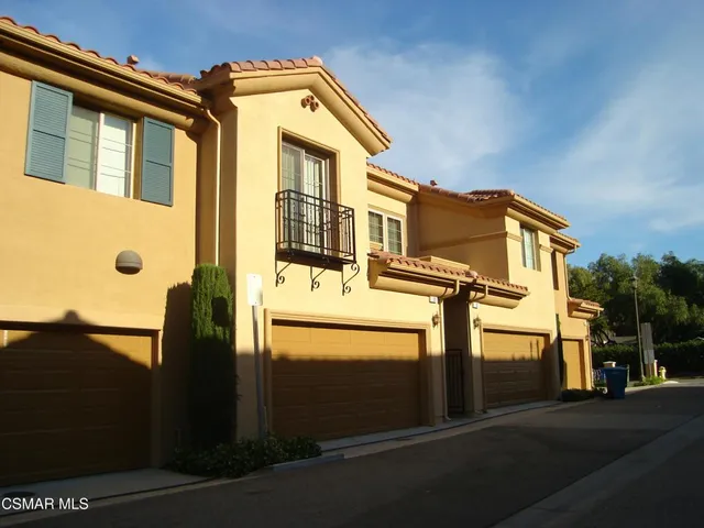 a front view of a building with a street