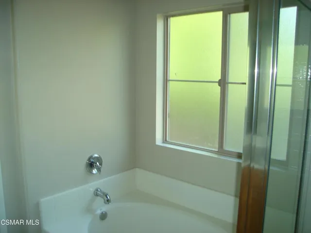 a bathroom with a sink and toilet