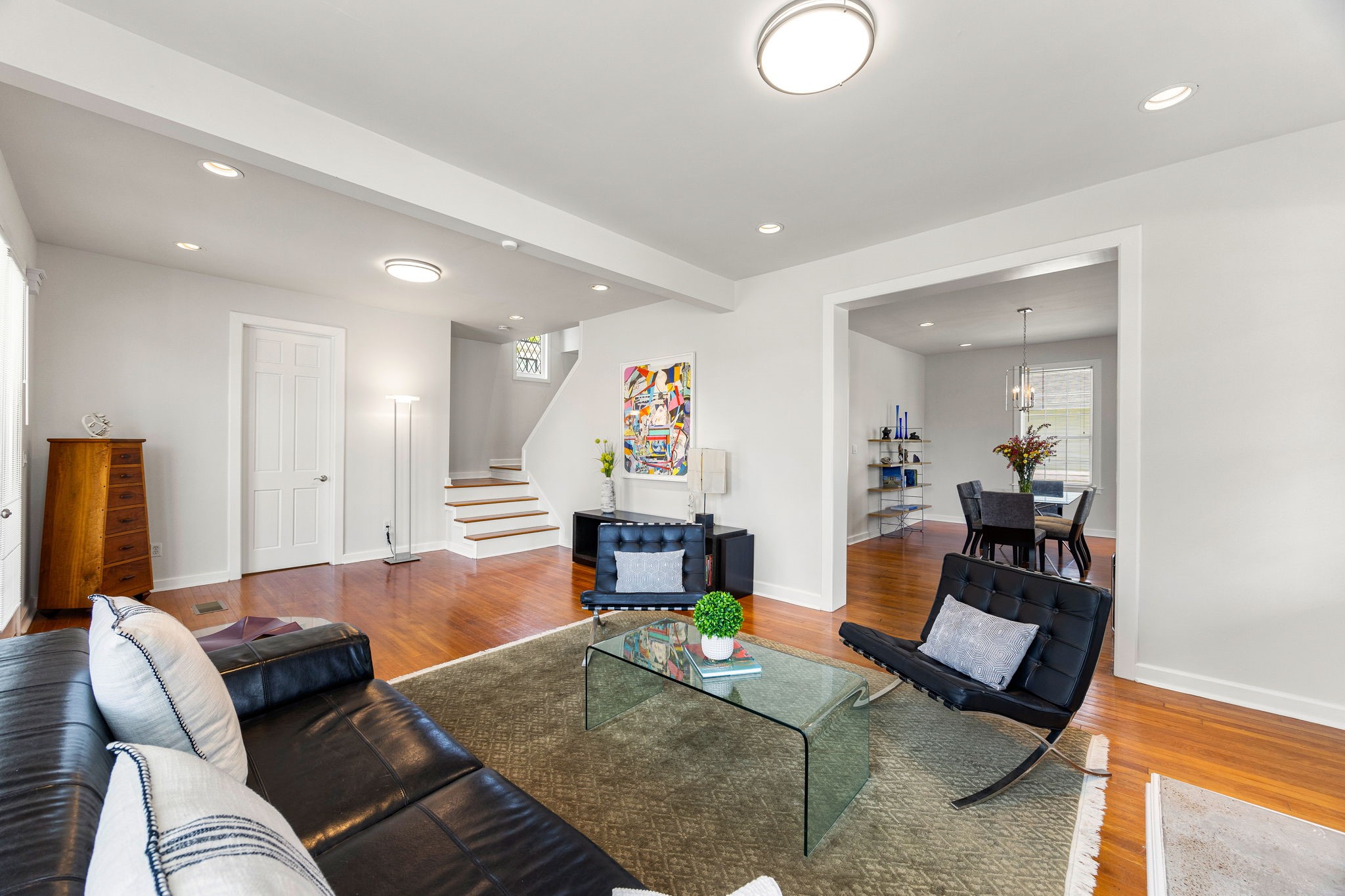 302 West Drew Street Houston, TX 77006 - Photo 14 of 48 a living room with furniture and a wooden floor