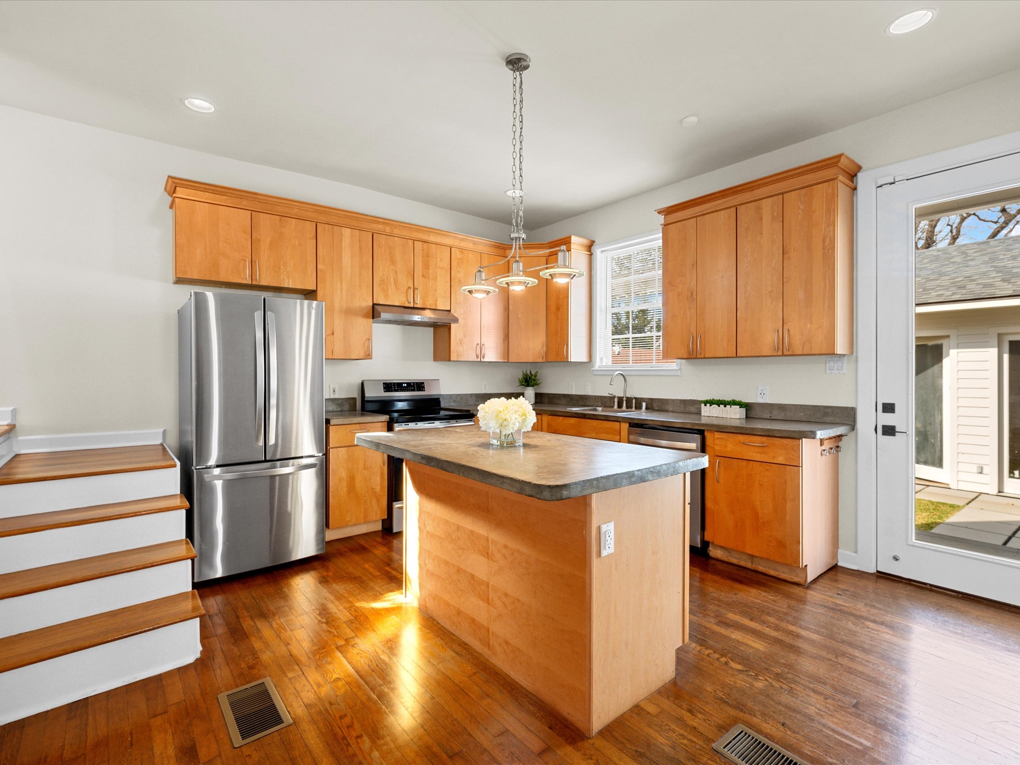302 West Drew Street Houston, TX 77006 - Photo 20 of 48 a kitchen with stainless steel appliances granite countertop a refrigerator a sink dishwasher a stove and a refrigerator