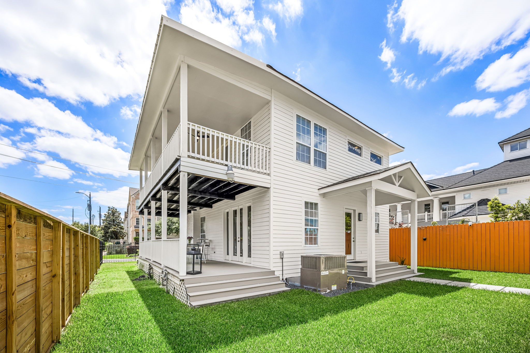 302 West Drew Street Houston, TX 77006 - Photo 38 of 48 a front view of a house with a yard table and chairs
