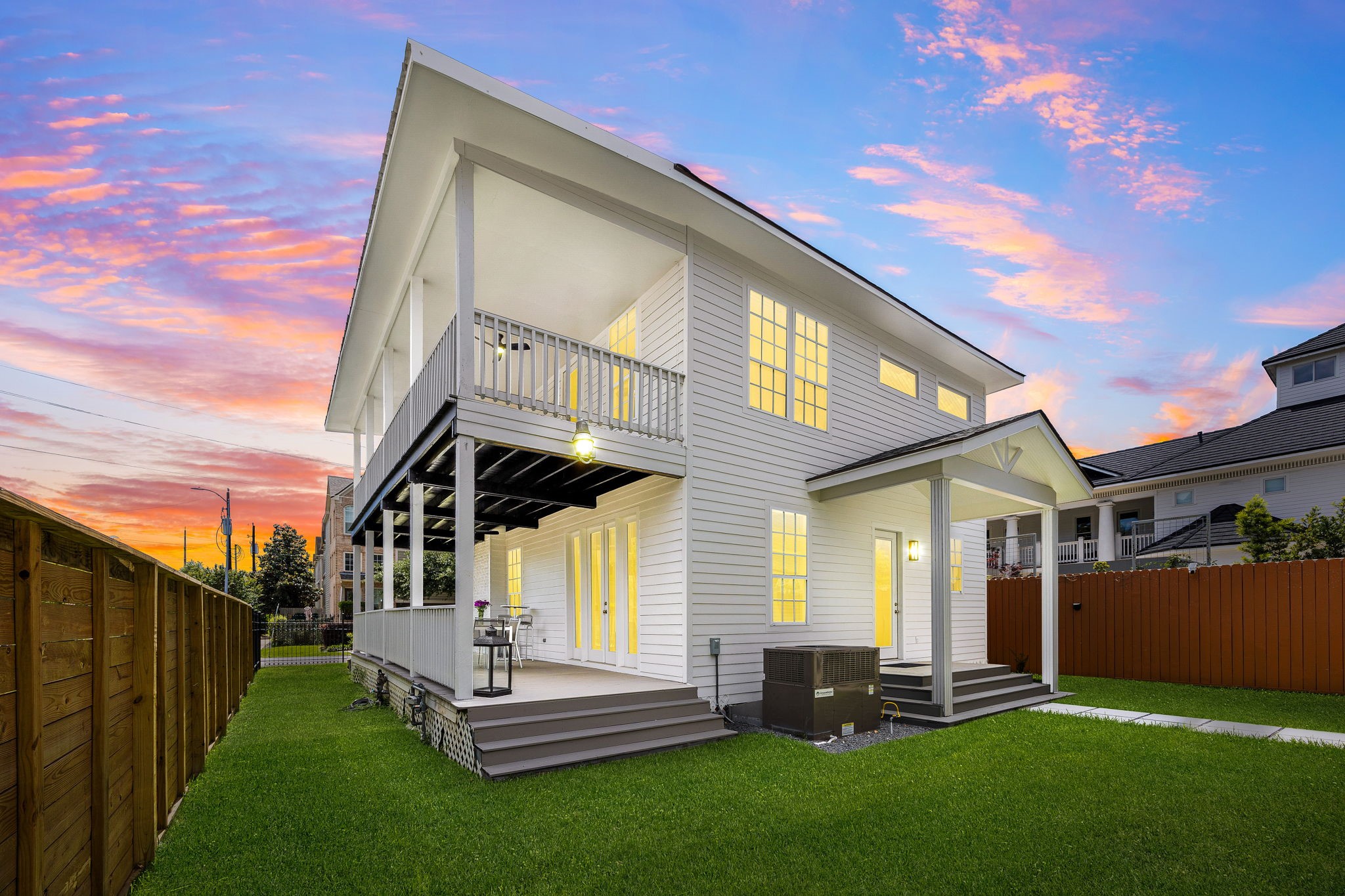 302 West Drew Street Houston, TX 77006 - Photo 6 of 48 a front view of a house with a yard table and chairs
