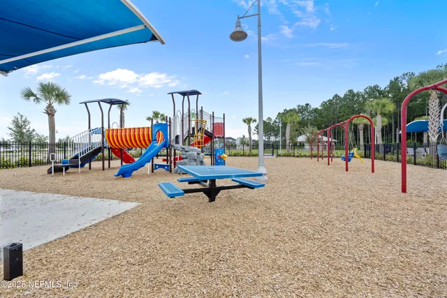 a view of an outdoor space patio swimming pool and ocean view