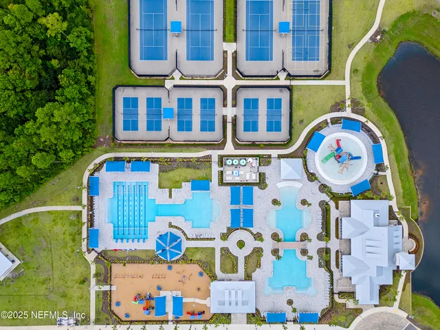 a view of swimming pool and outdoor seating