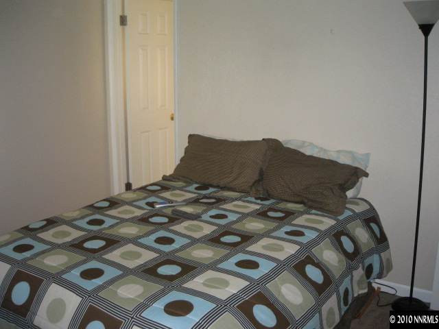 700 Wyoming Avenue Reno, NV 89503 - Photo 7 of 9 a bedroom with a bed in it