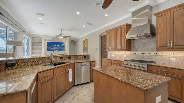 a bathroom with a granite countertop sink a mirror and a shower