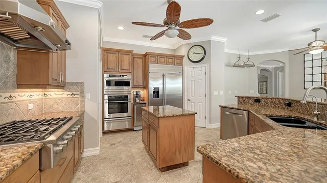 a bedroom with a bed and a tv