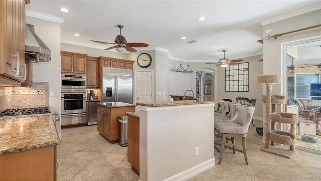 a bedroom with a bed and a table