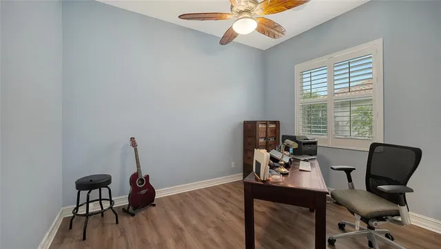 a view of room window and wooden floor