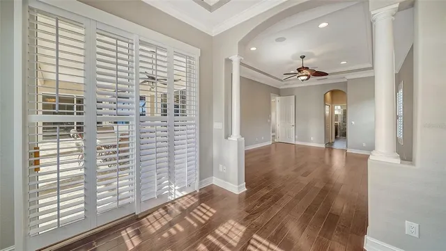 a view of a swimming pool with a patio
