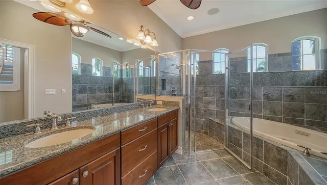 a view of a swimming pool with a patio