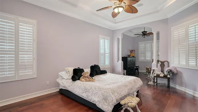 an aerial view of residential houses with outdoor space and swimming pool