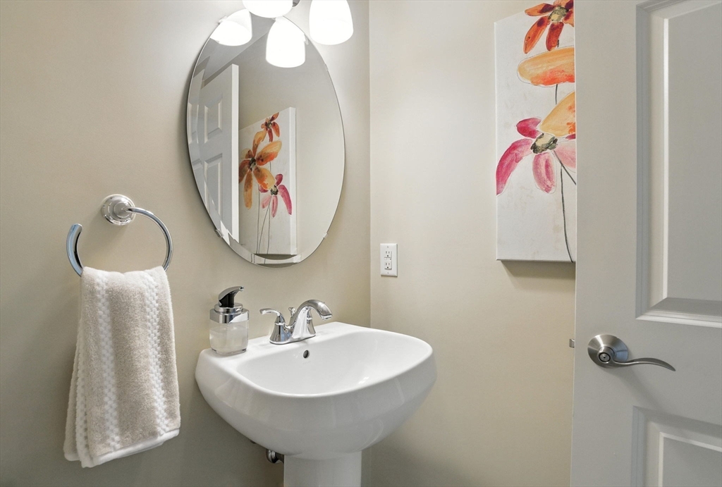 5 Trail Ridge Way, Unit C Harvard, MA 01451 - Photo 14 of 26 a bathroom with a sink and mirror