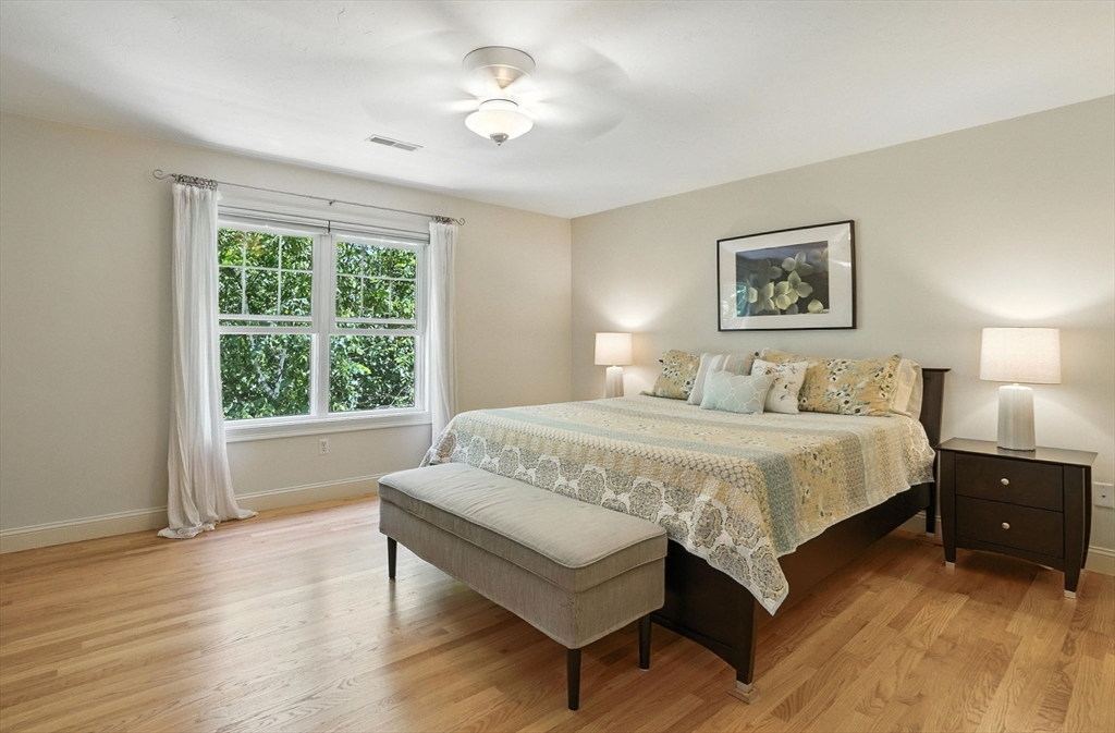 5 Trail Ridge Way, Unit C Harvard, MA 01451 - Photo 16 of 26 a spacious bedroom with a large bed and a window