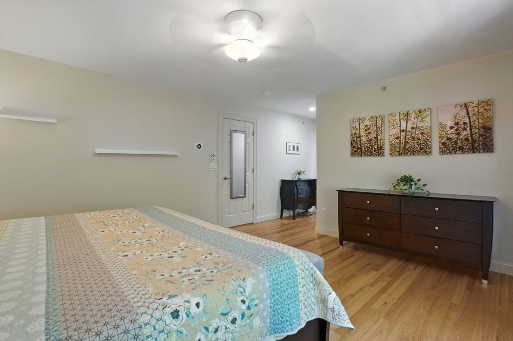 5 Trail Ridge Way, Unit C Harvard, MA 01451 - Photo 17 of 26 a bedroom with a bed and a dresser