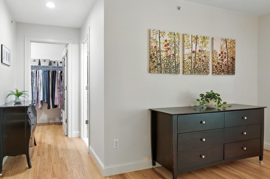 5 Trail Ridge Way, Unit C Harvard, MA 01451 - Photo 18 of 26 a room with a cabinet and a potted plant