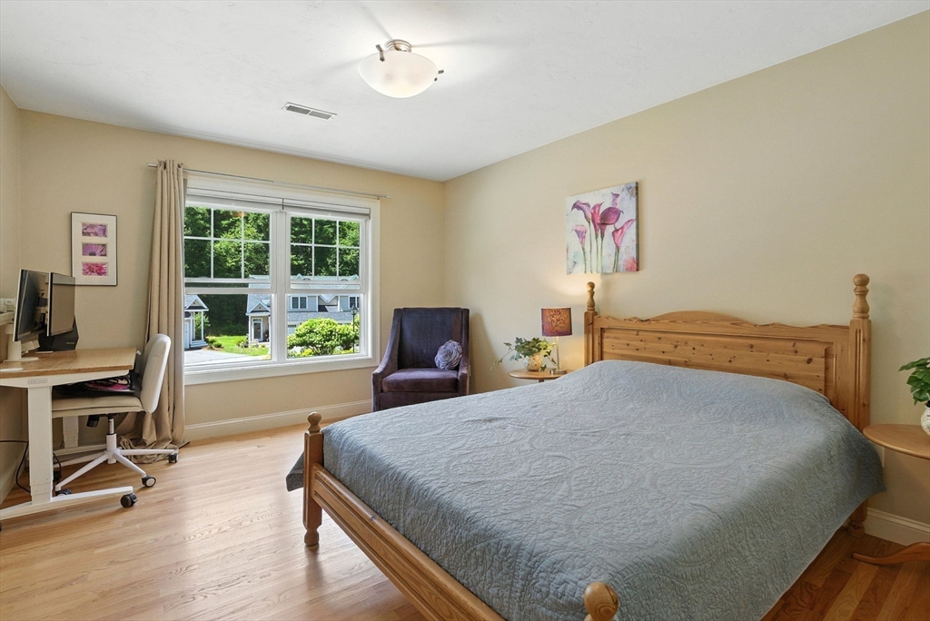 5 Trail Ridge Way, Unit C Harvard, MA 01451 - Photo 21 of 26 a bedroom with a bed and a desk