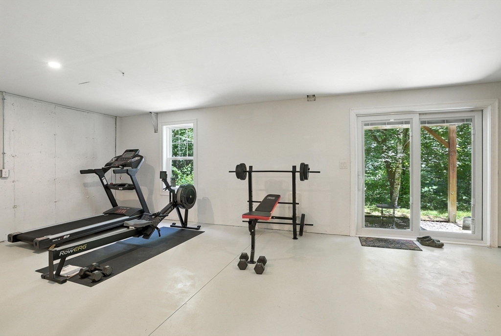 5 Trail Ridge Way, Unit C Harvard, MA 01451 - Photo 23 of 26 a view of a room with gym equipment