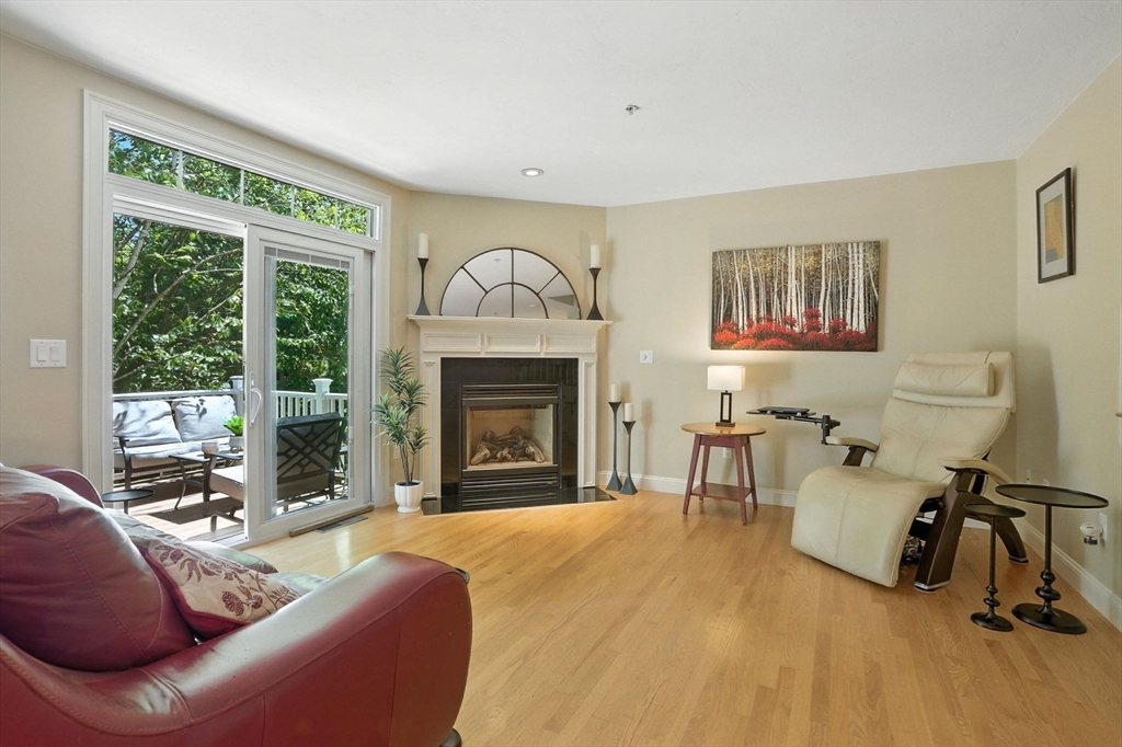 5 Trail Ridge Way, Unit C Harvard, MA 01451 - Photo 6 of 26 a living room with furniture and a fireplace