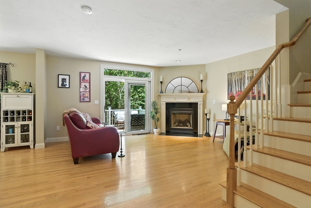 5 Trail Ridge Way, Unit C Harvard, MA 01451 - Photo 7 of 26 a living room with furniture and a fireplace