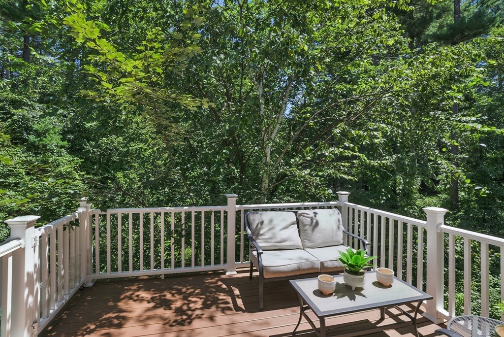 5 Trail Ridge Way, Unit C Harvard, MA 01451 - Photo 8 of 26 a view of balcony with wooden floor and outdoor seating