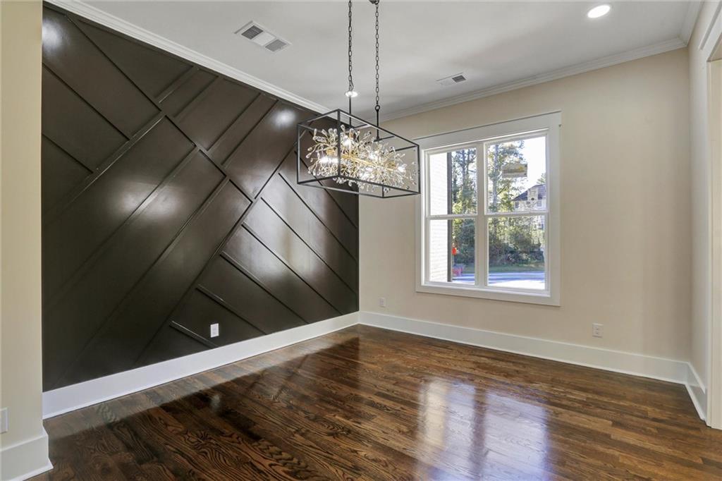 3629 Centerville Rosebud Road Snellville, GA 30039 - Photo 7 of 54 a view of a room with wooden floor chandelier and windows