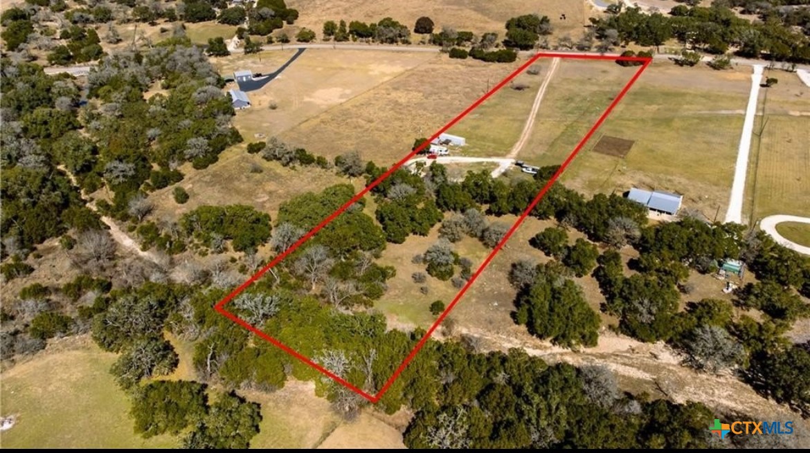 3411 Mail Rte Road Fischer, TX 78623 - Photo 3 of 12 an aerial view of residential houses with outdoor space