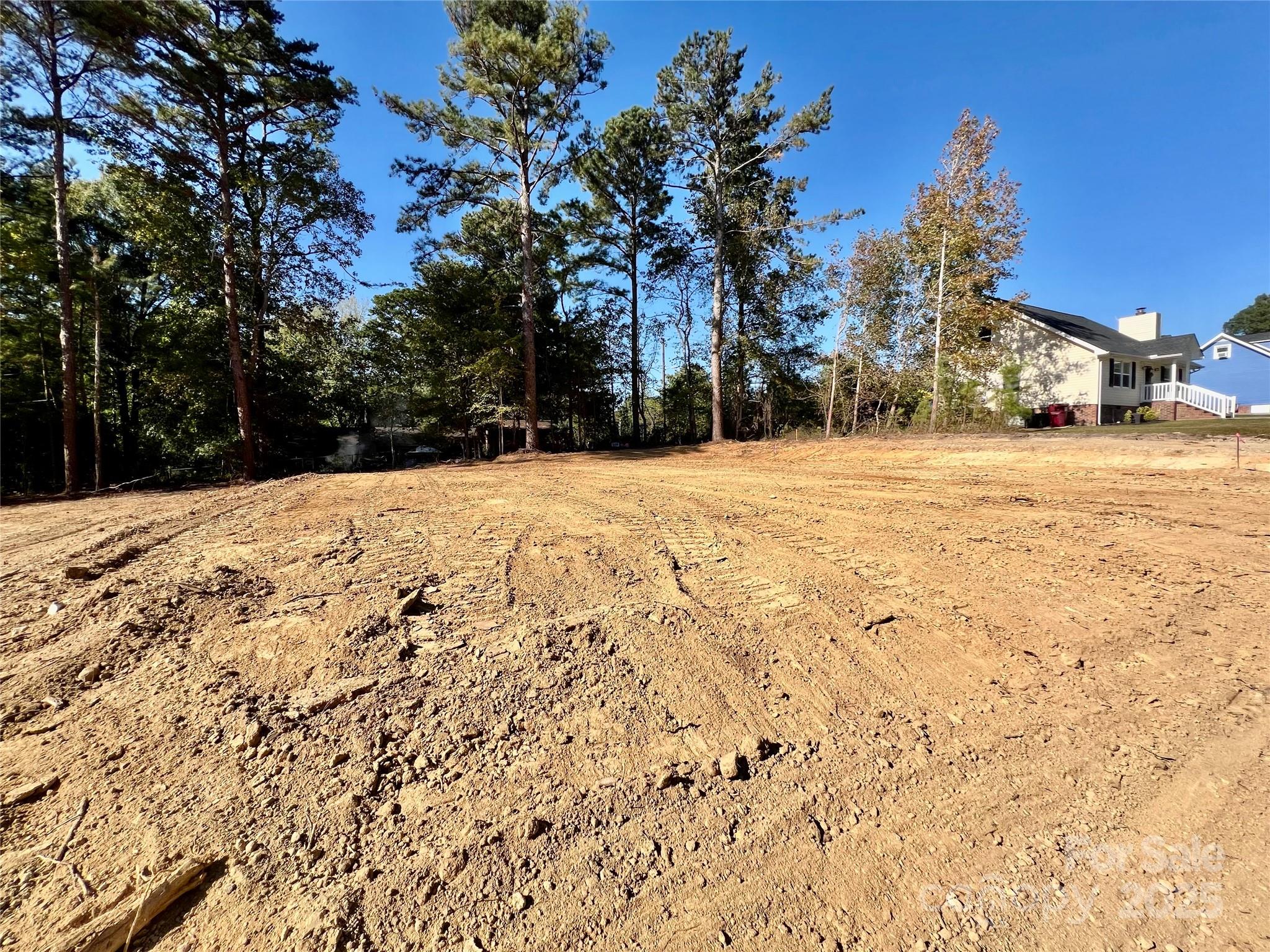 0 Watson Drive, Unit 38 Lancaster, SC 29720 - Photo 4 of 8 a view of empty space covered with snow in front of house