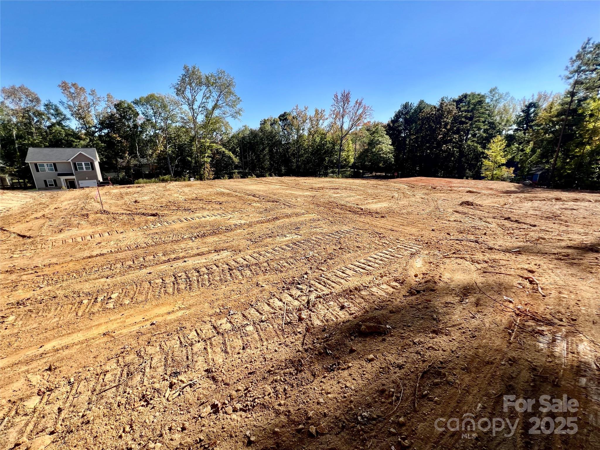 0 Watson Drive, Unit 38 Lancaster, SC 29720 - Photo 7 of 8 a view of white house with a yard