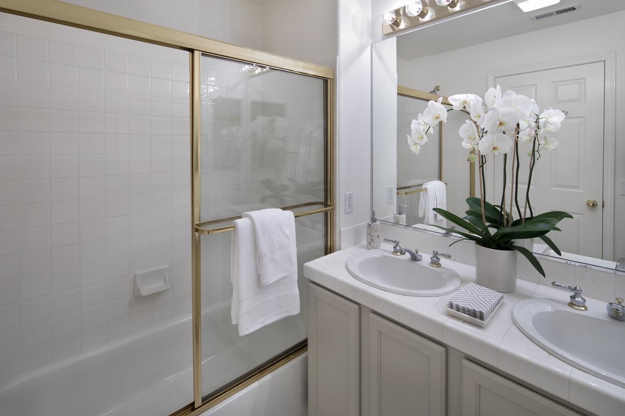 113 Pacchetti Way Mountain View, CA 94040 - Photo 8 of 20 a bathroom with a sink and a mirror
