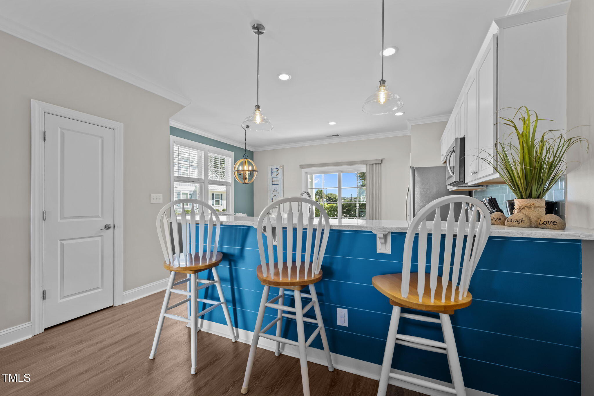 2800 West Fort Macon Road, Unit 37 Atlantic Beach, NC 28512 - Photo 8 of 39 a view of a dining room with furniture and a window
