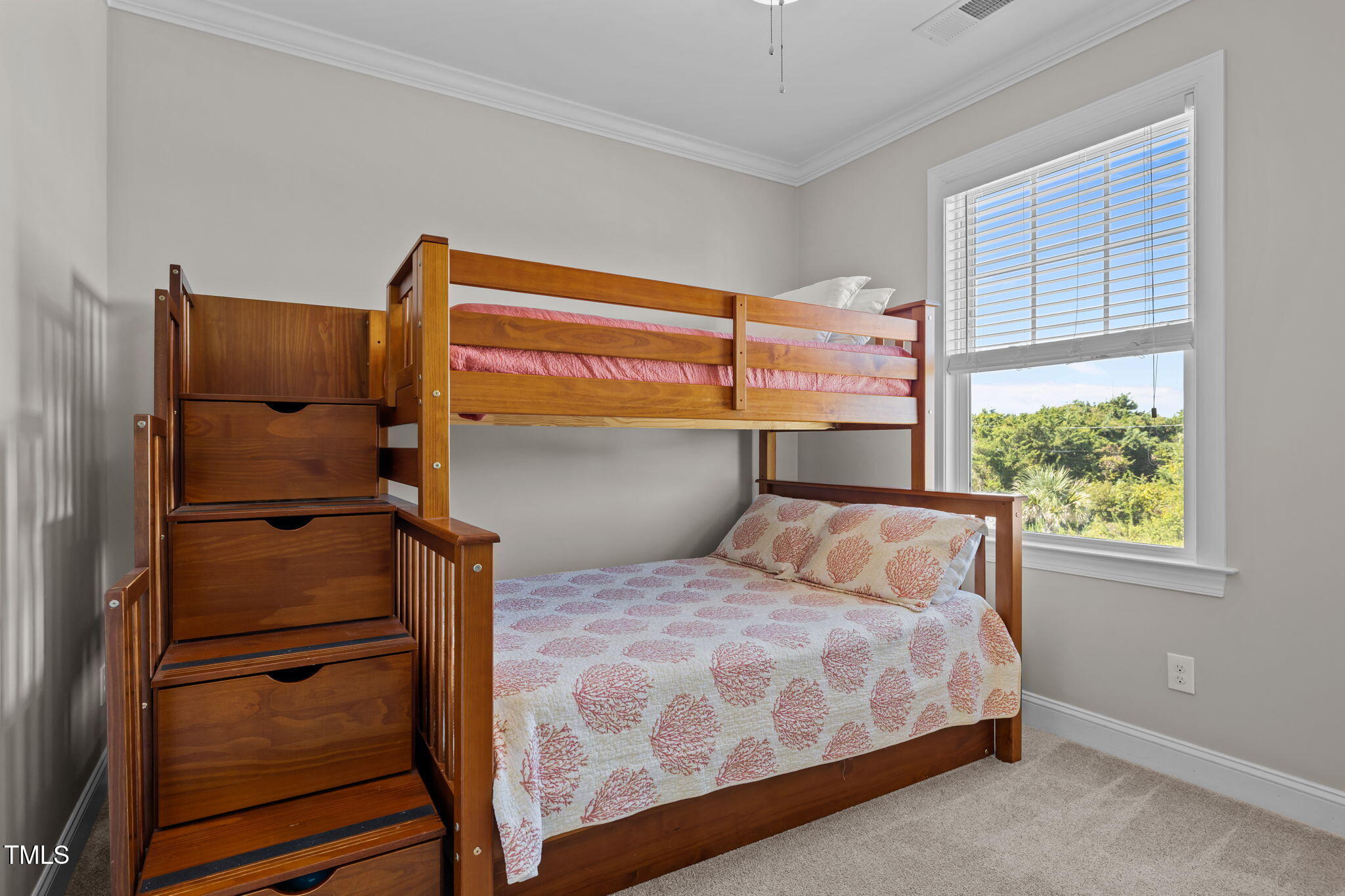 2800 West Fort Macon Road, Unit 37 Atlantic Beach, NC 28512 - Photo 15 of 39 a bedroom with a bed and a window