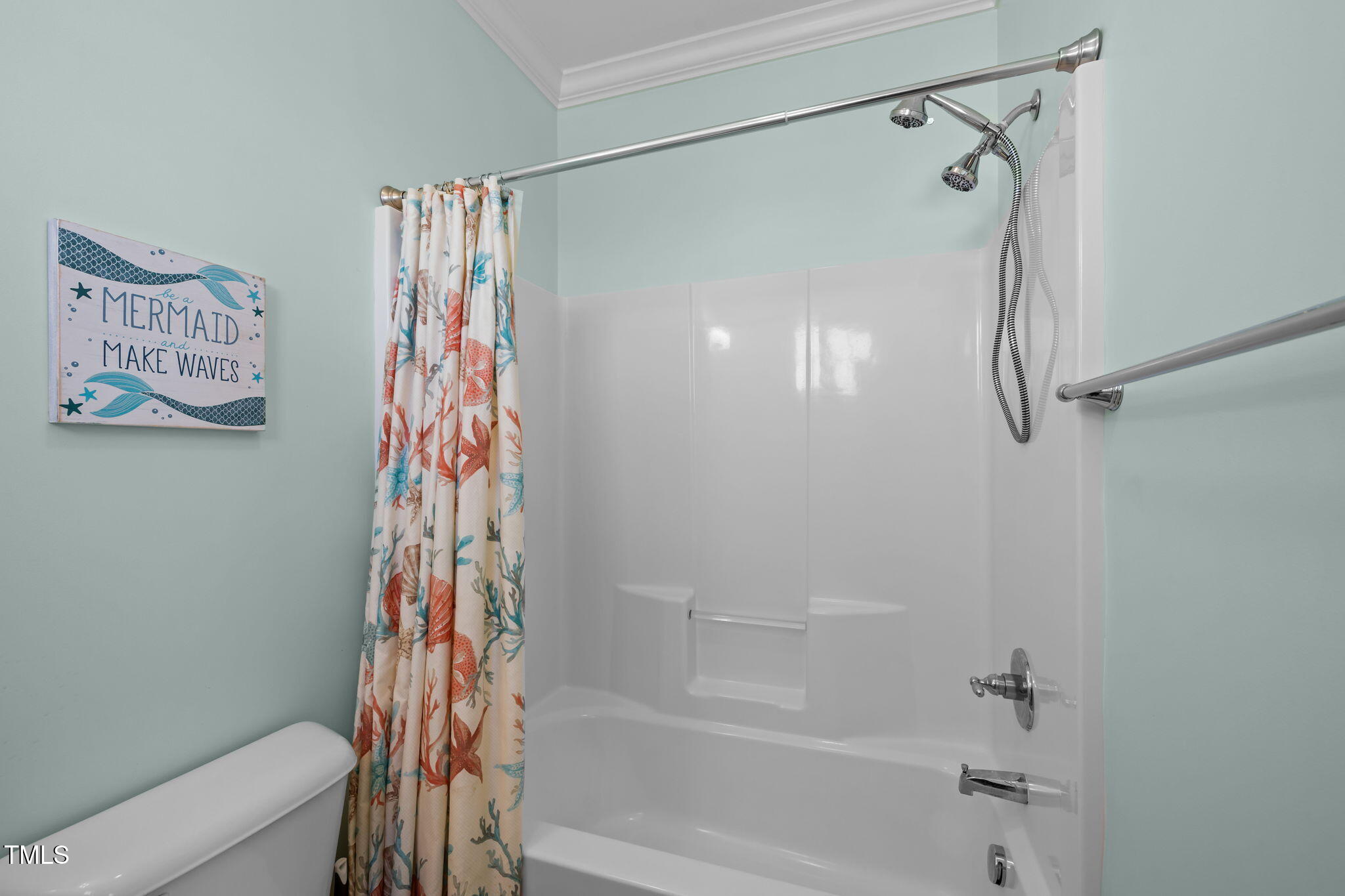 2800 West Fort Macon Road, Unit 37 Atlantic Beach, NC 28512 - Photo 16 of 39 a bathroom with a shower curtain and a shower curtain