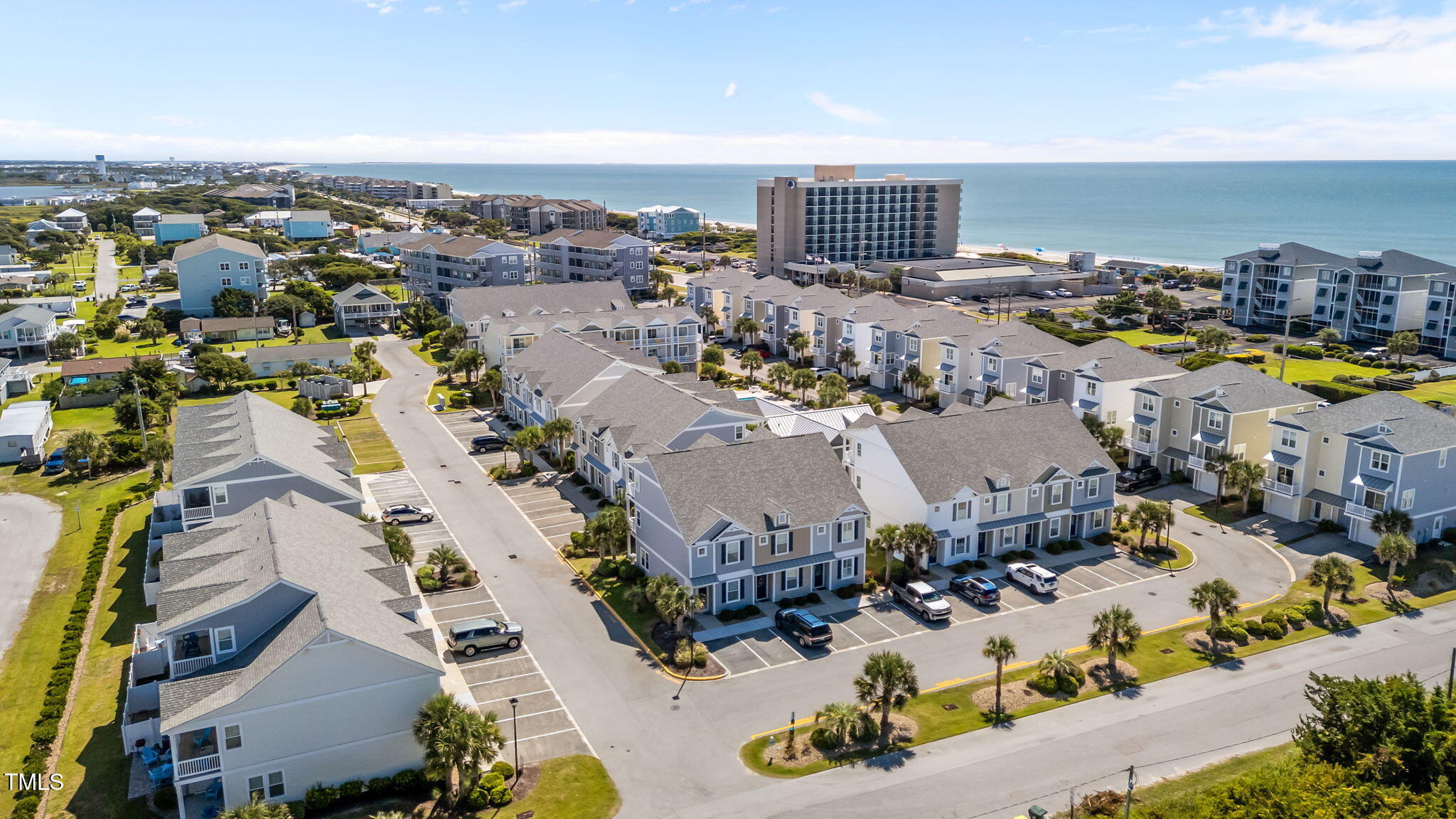 2800 West Fort Macon Road, Unit 37 Atlantic Beach, NC 28512 - Photo 34 of 39 an aerial view of residential houses with outdoor space